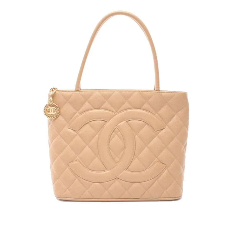 Small Vegan Leather Tote Bag in Blush Pink with Gold - Tone Hardware for a Feminine and Stylish AccessoryBeige Chanel Caviar Medallion Tote Small Vegan Leather Tote Bag in Blush Pink with Gold - Tone Hardware for a Feminine and Stylish AccessoryBeige Chanel Caviar Medallion Tote