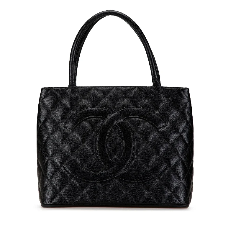 Metallic Tote Bag in Rose Gold with Chain Handles for a Glamorous Night OutBlack Chanel Caviar Medallion Tote Metallic Tote Bag in Rose Gold with Chain Handles for a Glamorous Night OutBlack Chanel Caviar Medallion Tote