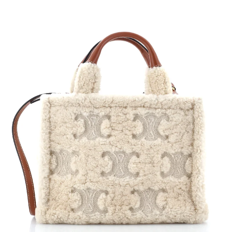 Small Vegan Leather Tote Bag in Blush Pink with Gold - Tone Hardware for a Feminine and Stylish AccessoryPatchwork Tote Bag in Denim with Vintage - Inspired Designs for a Retro AppealCabas Thais Tote Triomphe Embroidered Shearling Small Small Vegan Leather Tote Bag in Blush Pink with Gold - Tone Hardware for a Feminine and Stylish AccessoryPatchwork Tote Bag in Denim with Vintage - Inspired Designs for a Retro AppealCabas Thais Tote Triomphe Embroidered Shearling Small