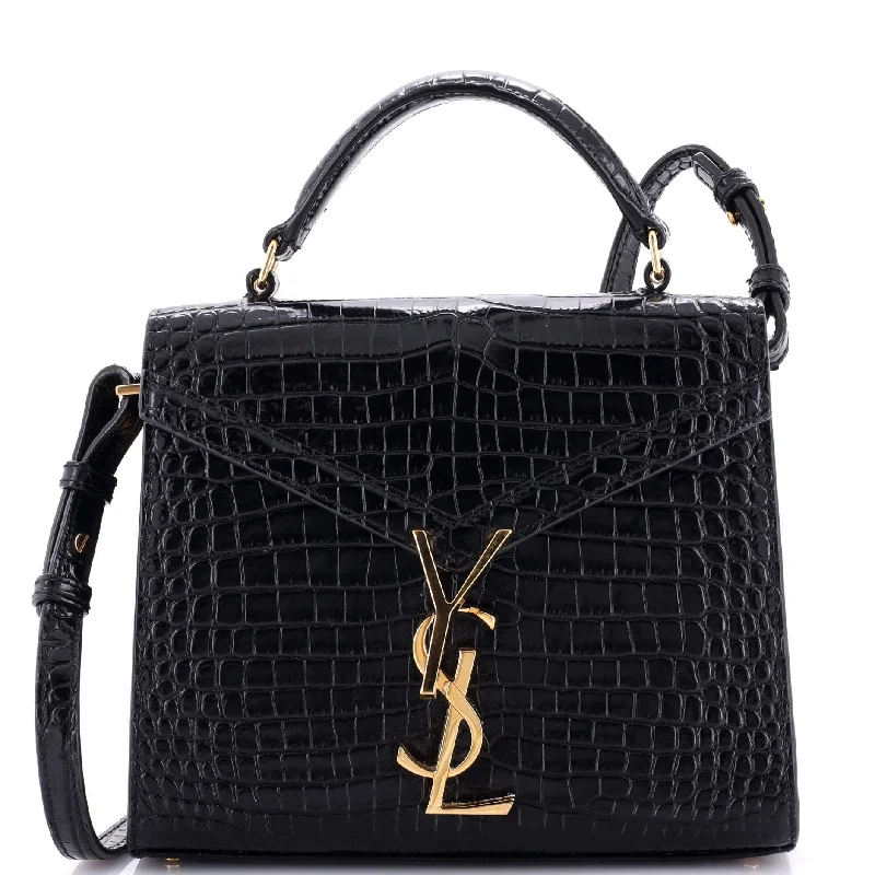 Suede Shoulder Bag in Pink with Tassel Accents for Casual OutingsCassandra Top Handle Bag Crocodile Embossed Leather Mini Suede Shoulder Bag in Pink with Tassel Accents for Casual OutingsCassandra Top Handle Bag Crocodile Embossed Leather Mini