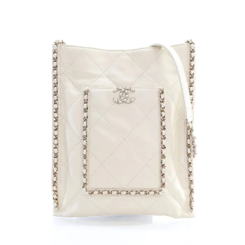 Metallic Tote Bag in Rose Gold with Chain Handles for a Glamorous Night OutChanel Quilted Shopping Tote Small White Calfskin Metallic Tote Bag in Rose Gold with Chain Handles for a Glamorous Night OutChanel Quilted Shopping Tote Small White Calfskin
