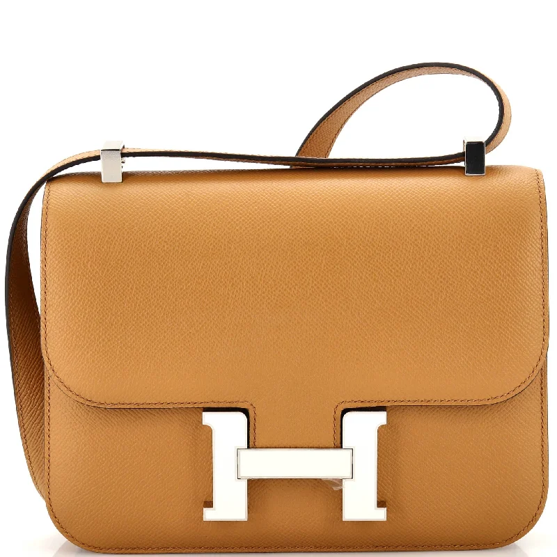Crossbody Shoulder Bag in Black Leather with Gold Hardware for Night OutsQuilted Shoulder Bag in Cream for a Classic and Elegant LookConstance NM Bag Epsom 18 Crossbody Shoulder Bag in Black Leather with Gold Hardware for Night OutsQuilted Shoulder Bag in Cream for a Classic and Elegant LookConstance NM Bag Epsom 18