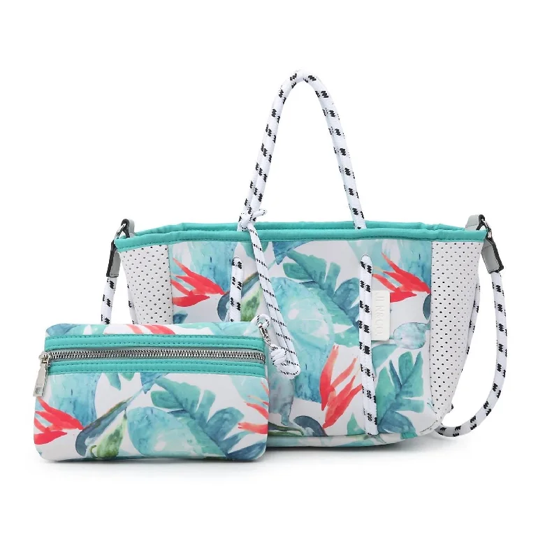 Patchwork Tote Bag in Denim with Vintage - Inspired Designs for a Retro AppealOversized Jute Tote Bag in Natural Color with Rope Handles for a Beach VacationCoralia Mini Neoprene Bag & Pouch Set In Tropical Green Patchwork Tote Bag in Denim with Vintage - Inspired Designs for a Retro AppealOversized Jute Tote Bag in Natural Color with Rope Handles for a Beach VacationCoralia Mini Neoprene Bag & Pouch Set In Tropical Green
