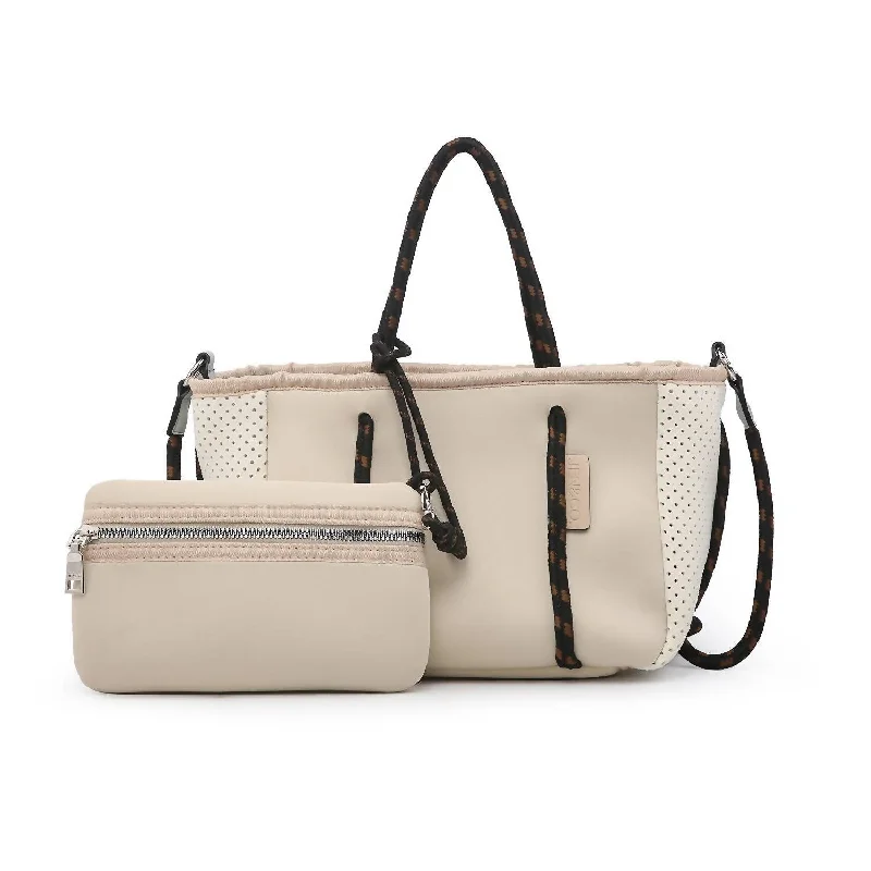 Metallic Tote Bag in Rose Gold with Chain Handles for a Glamorous Night OutWomen's Printed Tote Bag in Floral Patterns for a Spring - Themed Shopping TripCoralia Mini Neoprene Tote & Pouch In Beige Latte Metallic Tote Bag in Rose Gold with Chain Handles for a Glamorous Night OutWomen's Printed Tote Bag in Floral Patterns for a Spring - Themed Shopping TripCoralia Mini Neoprene Tote & Pouch In Beige Latte