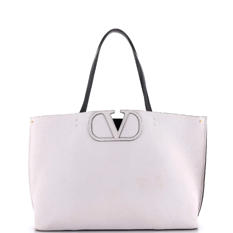 Geometric - Printed Tote Bag in Multicolor for a Contemporary and Trendy OutfitQuilted Tote Bag in Cream with Silver Hardware for a Classic and Sophisticated StyleFillme Tote Leather Medium Geometric - Printed Tote Bag in Multicolor for a Contemporary and Trendy OutfitQuilted Tote Bag in Cream with Silver Hardware for a Classic and Sophisticated StyleFillme Tote Leather Medium