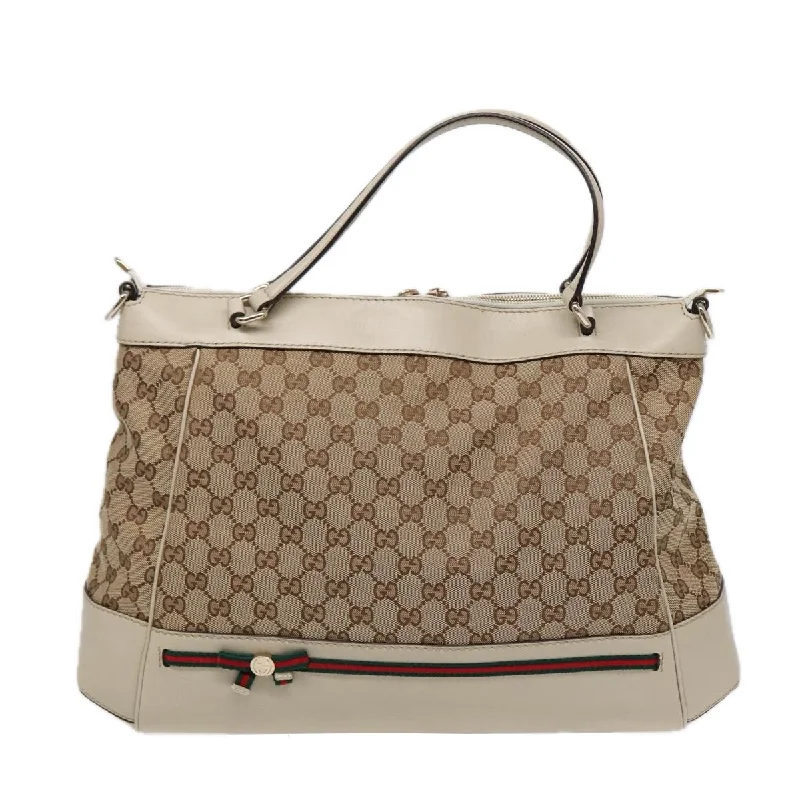 Metallic Tote Bag in Rose Gold with Chain Handles for a Glamorous Night OutGucci Sherry Canvas Tote Bag (Pre-Owned) Metallic Tote Bag in Rose Gold with Chain Handles for a Glamorous Night OutGucci Sherry Canvas Tote Bag (Pre-Owned)