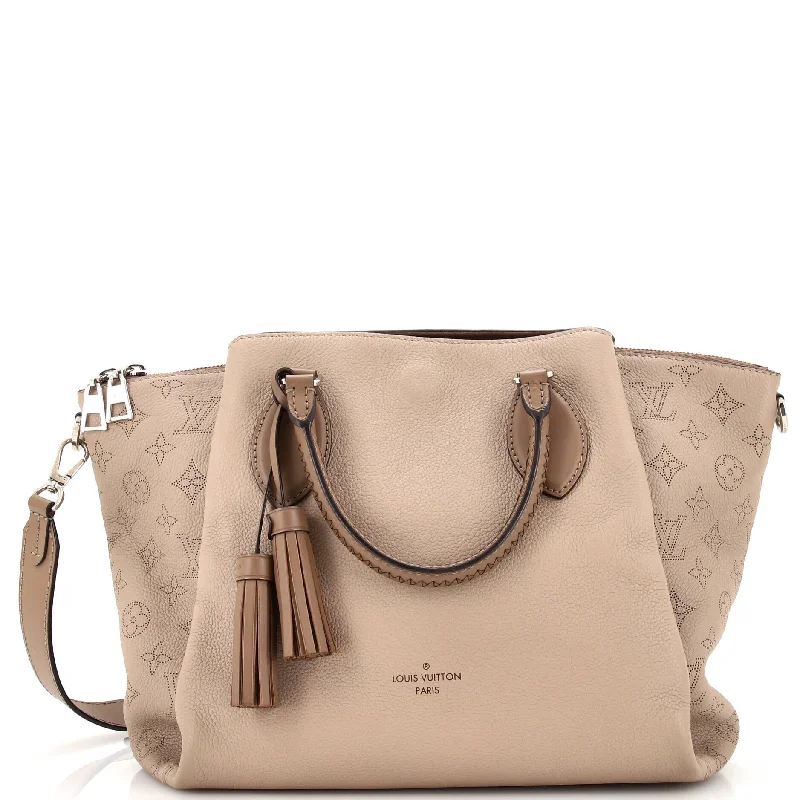 Metallic Shoulder Bag in Gold for Special OccasionsCanvas and Leather Combo Shoulder Bag in Tan for a Rustic LookHaumea Handbag Mahina Leather Metallic Shoulder Bag in Gold for Special OccasionsCanvas and Leather Combo Shoulder Bag in Tan for a Rustic LookHaumea Handbag Mahina Leather
