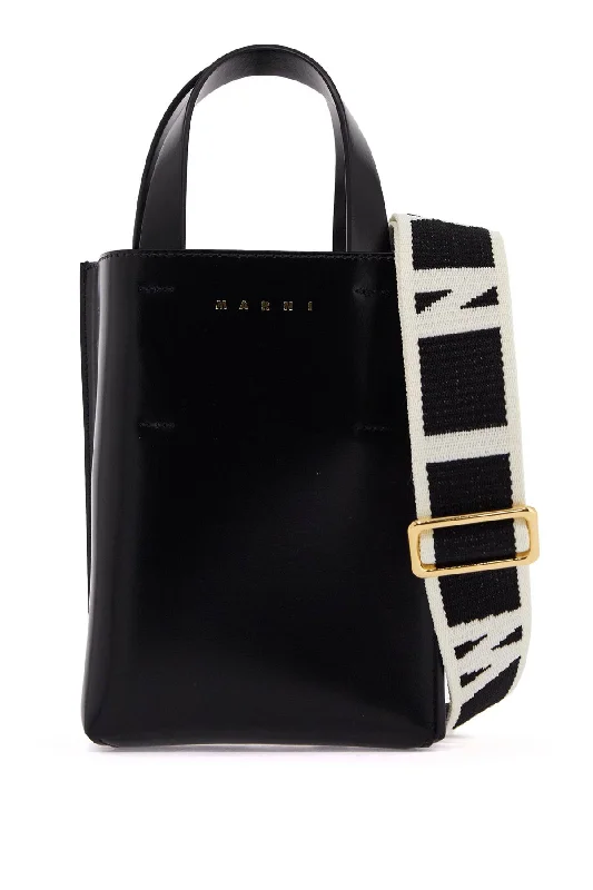 Large Capacity Genuine Leather Women's Tote Bag in Black for Work and CommutingWomen's Printed Tote Bag in Floral Patterns for a Spring - Themed Shopping TripMarni Women's Nano Museo Tote Bag Large Capacity Genuine Leather Women's Tote Bag in Black for Work and CommutingWomen's Printed Tote Bag in Floral Patterns for a Spring - Themed Shopping TripMarni Women's Nano Museo Tote Bag