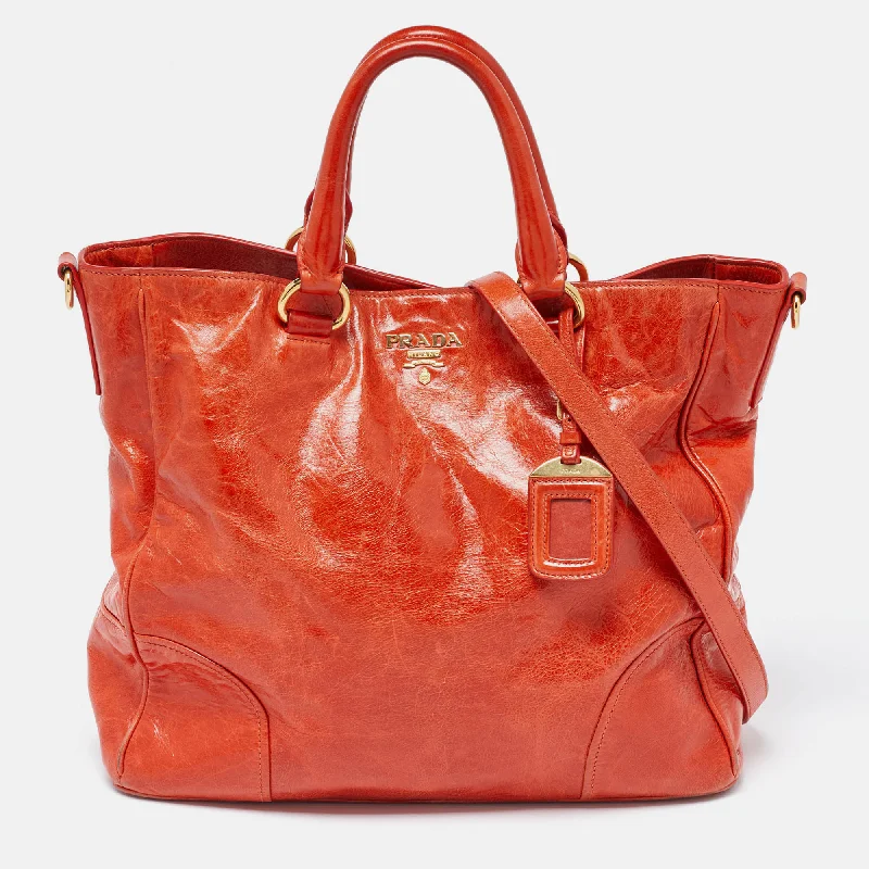 Women's Tote Bag with Magnetic Closure in Orange for Easy Access on the GoPrada Orange Vitello Shine Leather Snap Tote Women's Tote Bag with Magnetic Closure in Orange for Easy Access on the GoPrada Orange Vitello Shine Leather Snap Tote