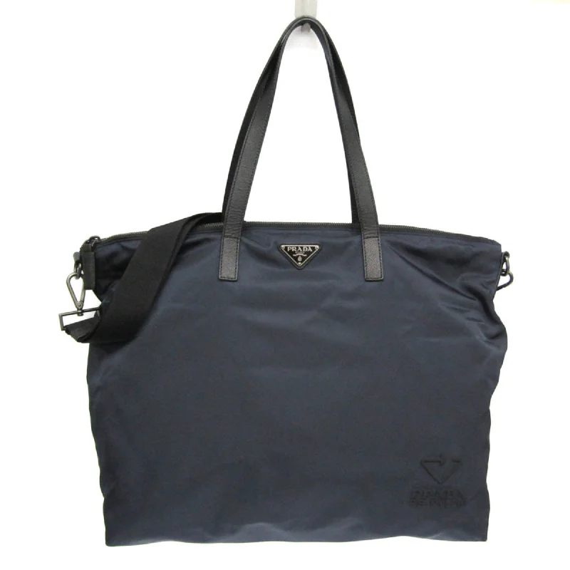 Patchwork Tote Bag in Denim with Vintage - Inspired Designs for a Retro AppealPrada Tessuto Synthetic Tote Bag (Pre-Owned) Patchwork Tote Bag in Denim with Vintage - Inspired Designs for a Retro AppealPrada Tessuto Synthetic Tote Bag (Pre-Owned)