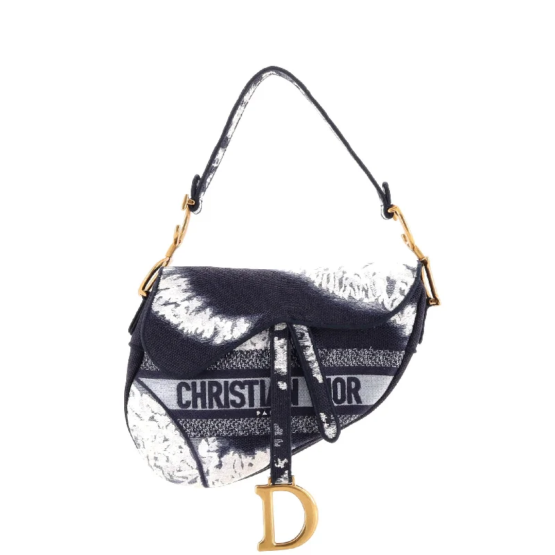 Leather Shoulder Bag with Magnetic Closure in Black for Quick AccessEmbroidered Denim Shoulder Bag in Blue for a Vintage VibeSaddle Bag Tie Dye Embroidered Canvas Medium Leather Shoulder Bag with Magnetic Closure in Black for Quick AccessEmbroidered Denim Shoulder Bag in Blue for a Vintage VibeSaddle Bag Tie Dye Embroidered Canvas Medium