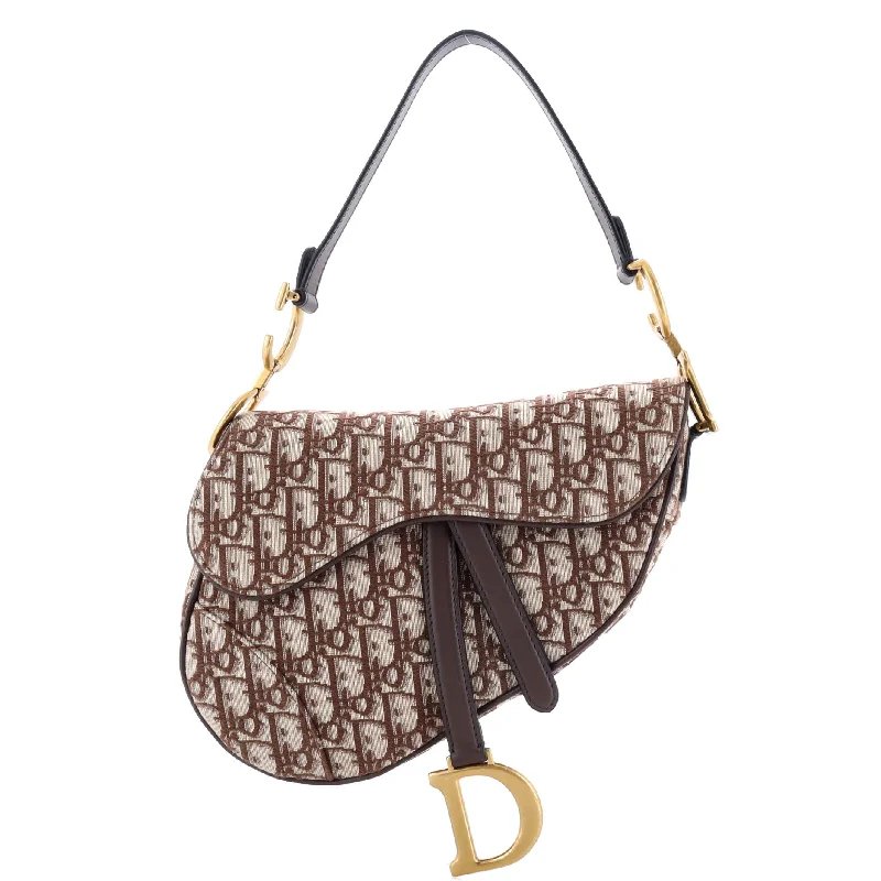 Vegan Leather Shoulder Bag in Gray for Ethical Fashion LoversPvc Shoulder Bag in Clear with Glitter for a Fun and Modern LookSaddle Handbag Oblique Canvas Medium Vegan Leather Shoulder Bag in Gray for Ethical Fashion LoversPvc Shoulder Bag in Clear with Glitter for a Fun and Modern LookSaddle Handbag Oblique Canvas Medium