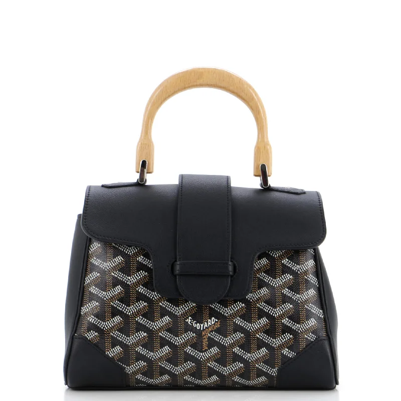 Women's Shoulder Bag with Fringe Details in Brown for a Bohemian StyleWomen's Shoulder Bag with Faux Fur Strap in White for Winter StyleSaigon Top Handle Bag Coated Canvas with Leather Mini Women's Shoulder Bag with Fringe Details in Brown for a Bohemian StyleWomen's Shoulder Bag with Faux Fur Strap in White for Winter StyleSaigon Top Handle Bag Coated Canvas with Leather Mini