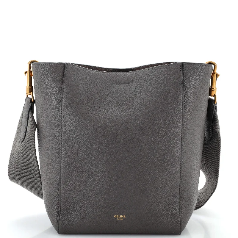 Pvc Shoulder Bag in Clear with Glitter for a Fun and Modern LookSangle Seau Bag Calfskin Small Pvc Shoulder Bag in Clear with Glitter for a Fun and Modern LookSangle Seau Bag Calfskin Small