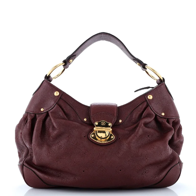 Women's Shoulder Bag with Fringe Details in Brown for a Bohemian StyleWomen's Shoulder Bag with Floral Embroidery in Purple for Spring WalksSolar Handbag Mahina Leather PM Women's Shoulder Bag with Fringe Details in Brown for a Bohemian StyleWomen's Shoulder Bag with Floral Embroidery in Purple for Spring WalksSolar Handbag Mahina Leather PM