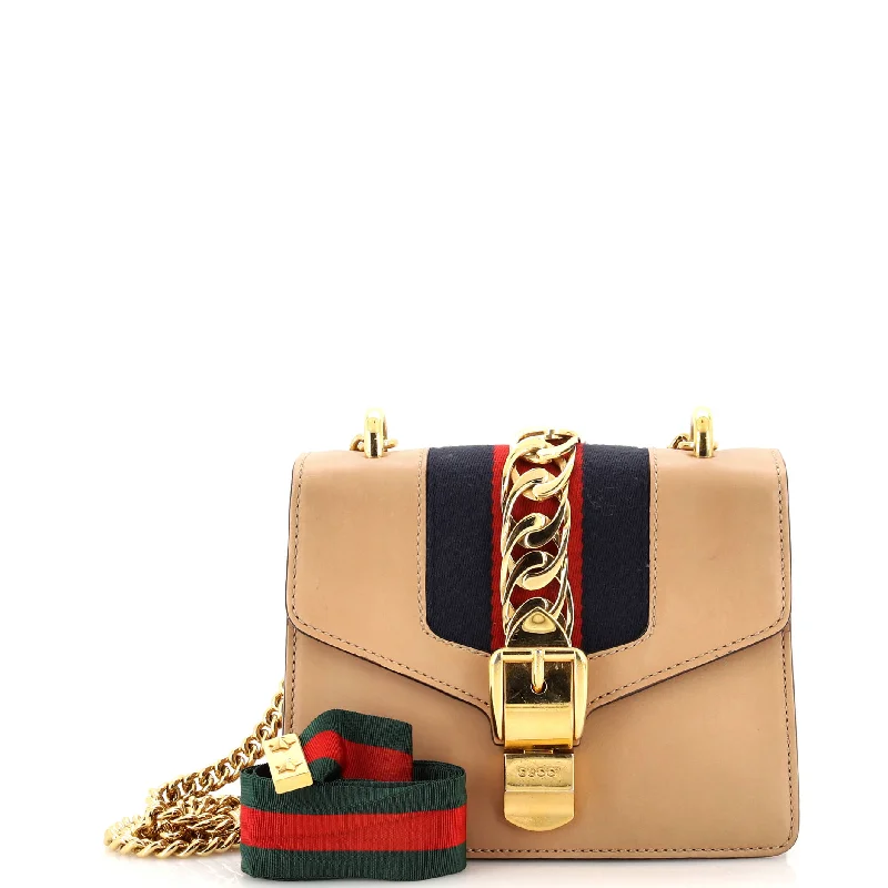 Leather Shoulder Bag with Magnetic Closure in Black for Quick AccessQuilted Shoulder Bag in Cream for a Classic and Elegant LookSylvie Chain Shoulder Bag Leather Mini Leather Shoulder Bag with Magnetic Closure in Black for Quick AccessQuilted Shoulder Bag in Cream for a Classic and Elegant LookSylvie Chain Shoulder Bag Leather Mini
