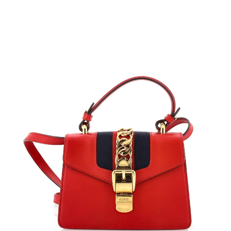 Shoulder Bag with Geometric Pattern in Multicolor for a Contemporary StyleLeather Shoulder Bag with Magnetic Closure in Black for Quick AccessSylvie Top Handle Bag Leather Mini Shoulder Bag with Geometric Pattern in Multicolor for a Contemporary StyleLeather Shoulder Bag with Magnetic Closure in Black for Quick AccessSylvie Top Handle Bag Leather Mini