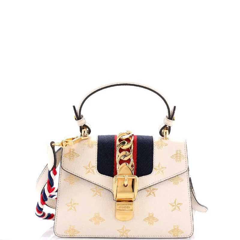 Women's Canvas Shoulder Bag in Navy with Striped Pattern for Beach TripsSylvie Top Handle Bag Printed Leather Mini Women's Canvas Shoulder Bag in Navy with Striped Pattern for Beach TripsSylvie Top Handle Bag Printed Leather Mini