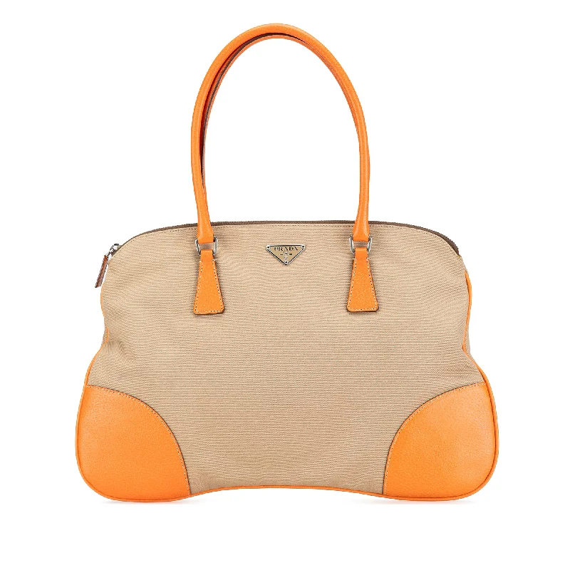 Monogrammed Tote Bag in Brown Leather with Personalized Initials for a Custom and Elegant TouchTan Prada Cinghiale Trimmed Canvas Canapa Tote Monogrammed Tote Bag in Brown Leather with Personalized Initials for a Custom and Elegant TouchTan Prada Cinghiale Trimmed Canvas Canapa Tote