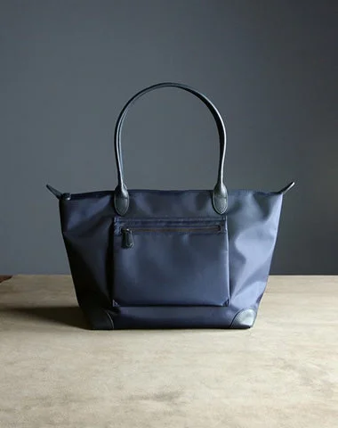 Quilted Tote Bag in Cream with Silver Hardware for a Classic and Sophisticated StyleWomen's Tote Bag with Magnetic Closure in Orange for Easy Access on the GoWomens Navy Nylon Shoulder Tote Large Dark Blue Nylon Handbag Purse for Ladies Quilted Tote Bag in Cream with Silver Hardware for a Classic and Sophisticated StyleWomen's Tote Bag with Magnetic Closure in Orange for Easy Access on the GoWomens Navy Nylon Shoulder Tote Large Dark Blue Nylon Handbag Purse for Ladies
