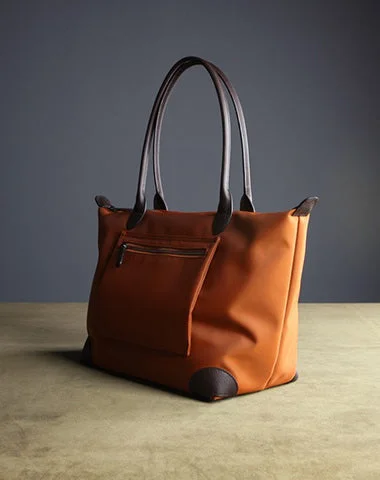 Large Capacity Genuine Leather Women's Tote Bag in Black for Work and CommutingWomen's Printed Tote Bag in Floral Patterns for a Spring - Themed Shopping TripWomens Orange Nylon Shoulder Tote Large Orange Nylon Handbag Purse for Ladies Large Capacity Genuine Leather Women's Tote Bag in Black for Work and CommutingWomen's Printed Tote Bag in Floral Patterns for a Spring - Themed Shopping TripWomens Orange Nylon Shoulder Tote Large Orange Nylon Handbag Purse for Ladies