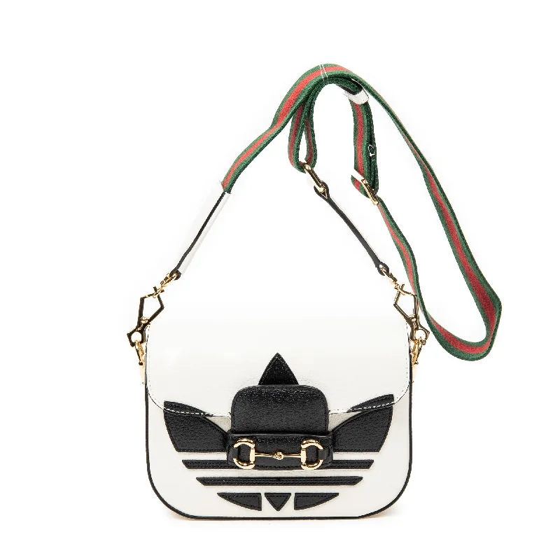 Geometric - Printed PVC Crossbody Bag in Multicolor for Trendy Street StyleGucci x Adidas Mini Horsebit 1955 Crossbody Geometric - Printed PVC Crossbody Bag in Multicolor for Trendy Street StyleGucci x Adidas Mini Horsebit 1955 Crossbody