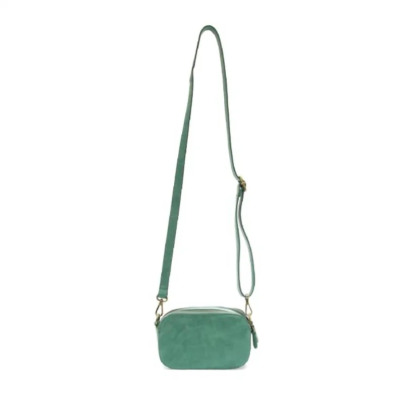 Quilted Leather Crossbody Bag in Cream for a Classic and Elegant AppearanceLayne Double Zip Mini Camera Crossbody Bag In Turquoise Quilted Leather Crossbody Bag in Cream for a Classic and Elegant AppearanceLayne Double Zip Mini Camera Crossbody Bag In Turquoise