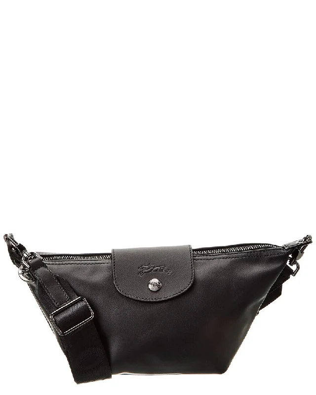 Leather - Trimmed Denim Crossbody Bag in Blue for a Vintage - Inspired LookLongchamp Le Pliage Xtra XS Leather Crossbody Leather - Trimmed Denim Crossbody Bag in Blue for a Vintage - Inspired LookLongchamp Le Pliage Xtra XS Leather Crossbody
