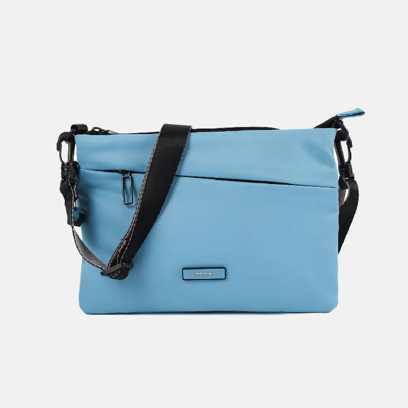 Metallic Crossbody Bag in Silver for New Year's Eve and Special CelebrationsOrbit Flat Crossbody In Summer Sky Blue Metallic Crossbody Bag in Silver for New Year's Eve and Special CelebrationsOrbit Flat Crossbody In Summer Sky Blue