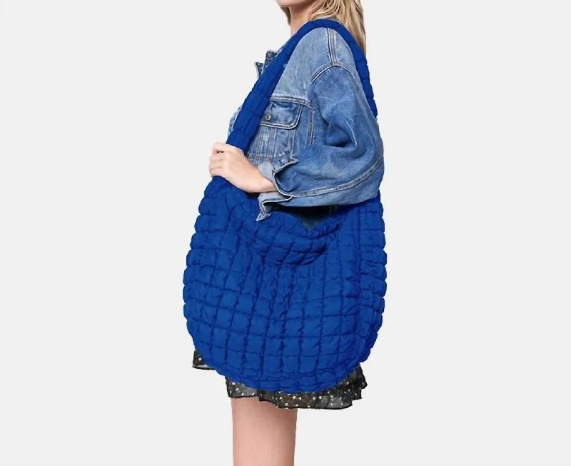 Women's Crossbody Bag with Zippered Pocket on the Back in Red for SecurityWomen's Quilted Puffer Shoulder Crossbody Cloud Bag In Royal Blue